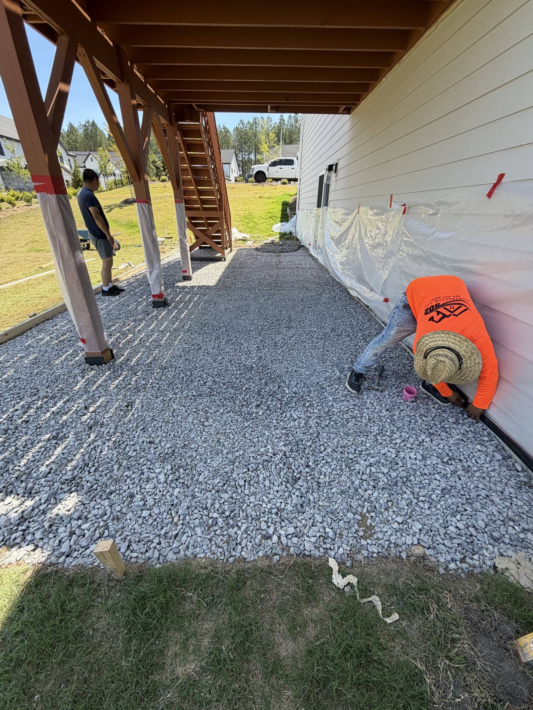 Under-deck patio — before
